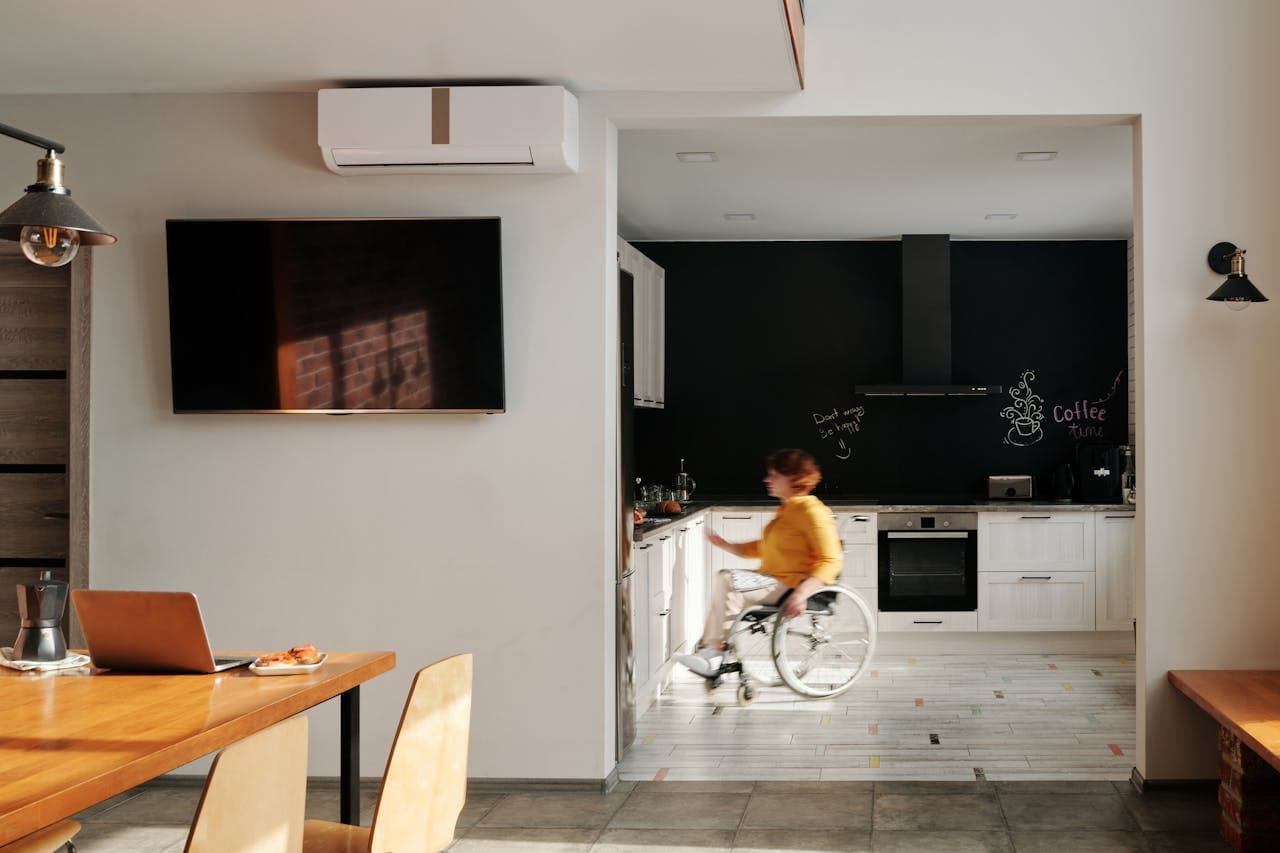 lady in wheelchair in kitchen