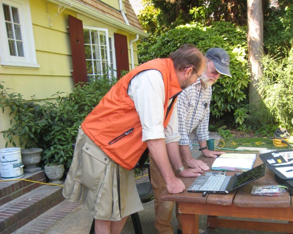Stephen reviewing drawings on job-site